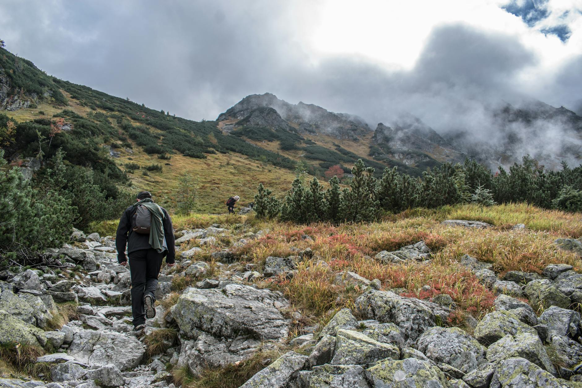 a man walking on the mountain